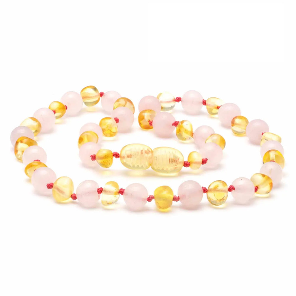 Rozenkwarts barnsteen ketting baby